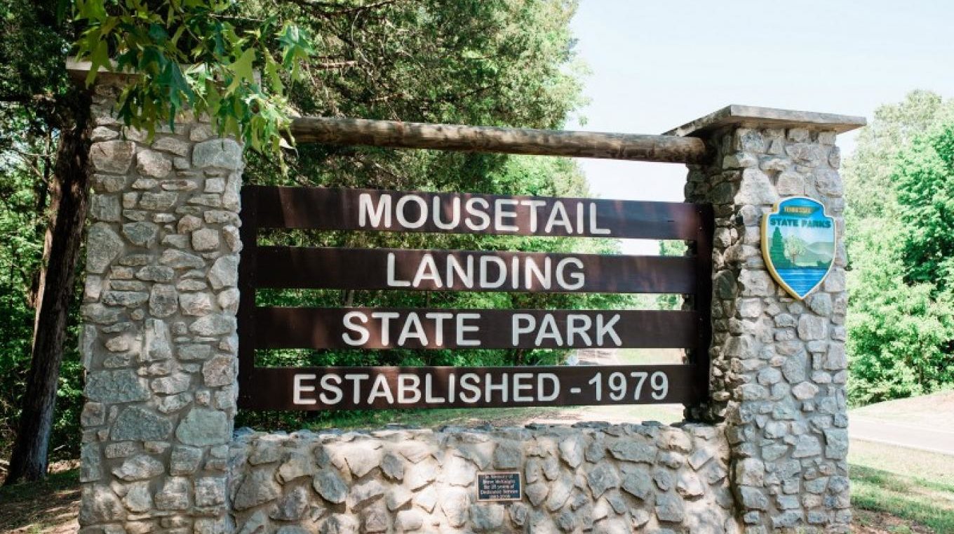 wooden sign stating Mousetail Landing State Park Established 1978